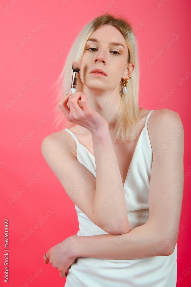 Fashionable young transgender woman on color background Fashionable young transgender woman on color background