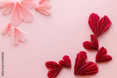 Stylish cute pink and red hearts flat lay on pink paper background. Creative valentines greeting card template with space for text. Happy Valentine s day   Love concept