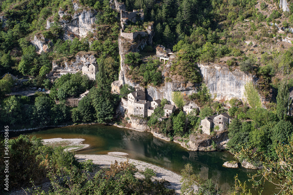 Picturesque village in the Gorges du Tarn in France with a typical bridge