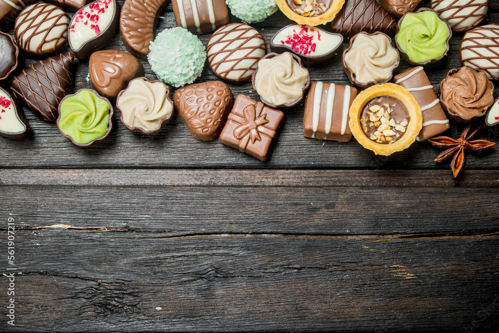 Chocolate sweets with nuts and various fillings. Chocolate sweets with nuts and various fillings.