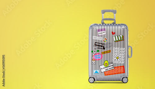 Travel bag vacation luggage with style stickers background concept.