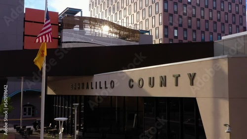Push in on downtown Albuquerque building featuring Bernalillo County sign. photo