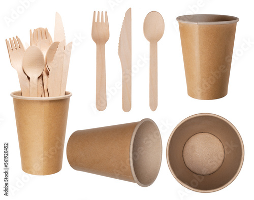 Paper gray cup for hot drinks and wooden disposable cutlery for dishes in fast food restaurants. Isolated background.