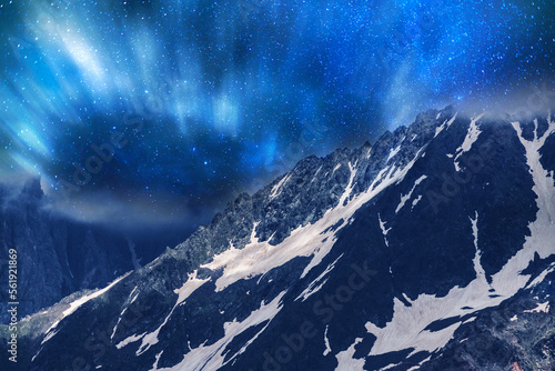 Fototapeta Naklejka Na Ścianę i Meble -  Fantasy night landscape. Beautiful snow covered mountains in the starry night with milky way galaxy.