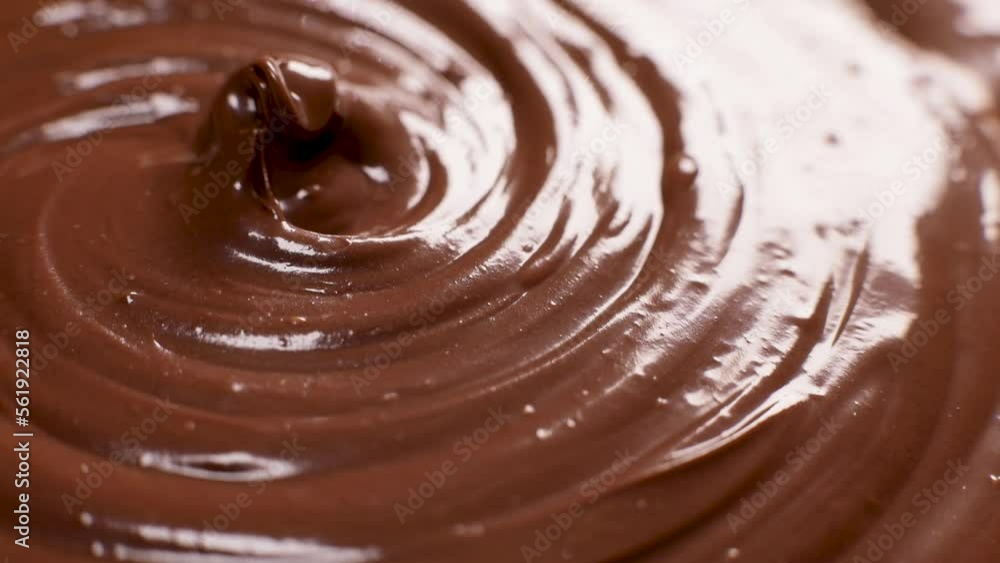 Shiny surface of chocolate hazelnut butter rotates Shiny surface of chocolate hazelnut butter rotates