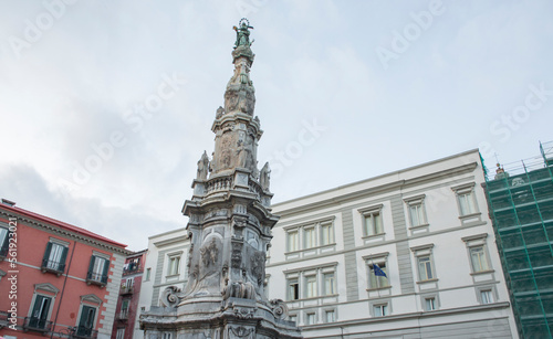 Closeup of obelisk Guglia of the Immaculate Virgin in the center of Piazza Gesù Nuovo located in Naples, Italy