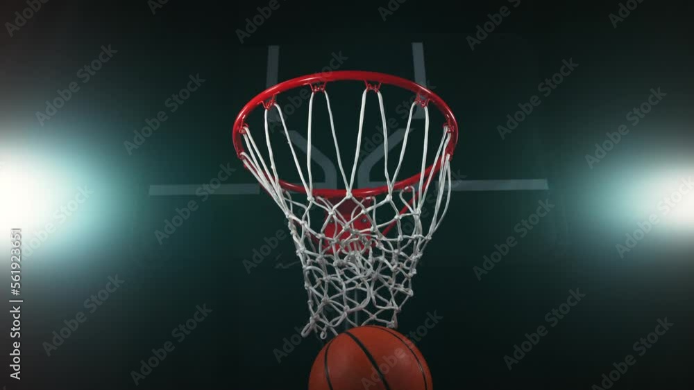 Super slow motion of basketball player hitting the basket. Filmed on high speed cinema camera Phantom, 1000fps. Speed ramp effect. Super slow motion of basketball player hitting the basket. Filmed on high speed cinema camera Phantom, 1000fps. Speed ramp effect.