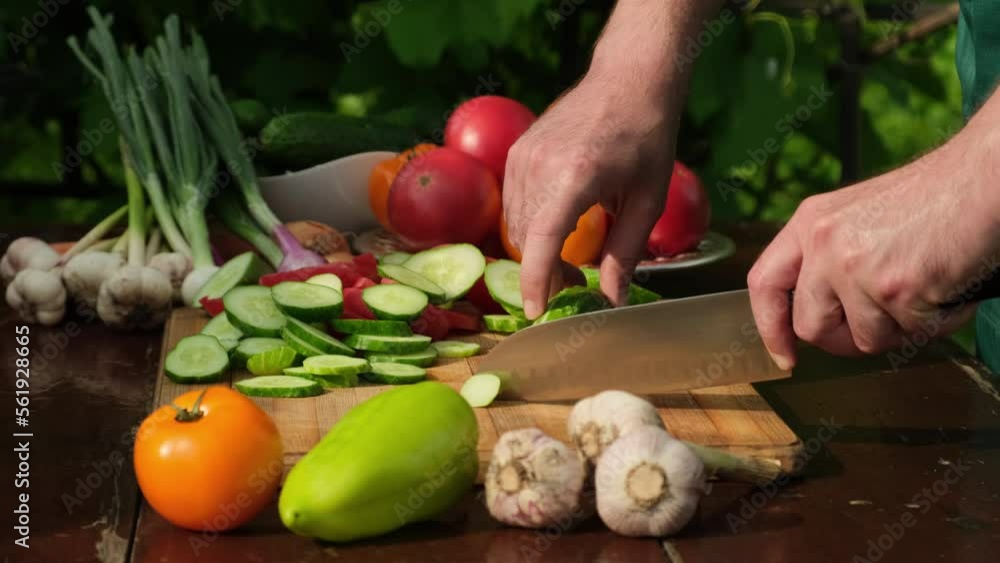 Salad. Vegetable Fresh Salad with Tomatoes, Cucumbers, Scallion and Olive Oil. Healthy Food. Vegetarian Diet. Making vegetable salad outdoors, Cutting Vegetables. Slow Motion Salad. Vegetable Fresh Salad with Tomatoes, Cucumbers, Scallion and Olive Oil. Healthy Food. Vegetarian Diet. Making vegetable salad outdoors, Cutting Vegetables. Slow Motion