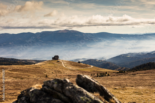 mountain hut in the carinthian alps looking west towards koralpe at the carinthian and styrian border. photo