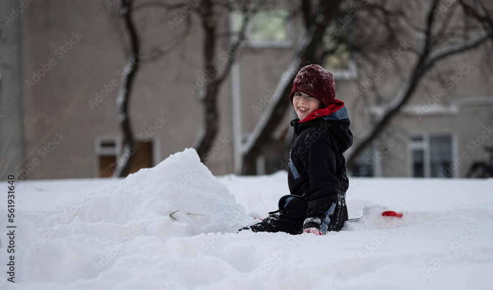 woman playing with snow