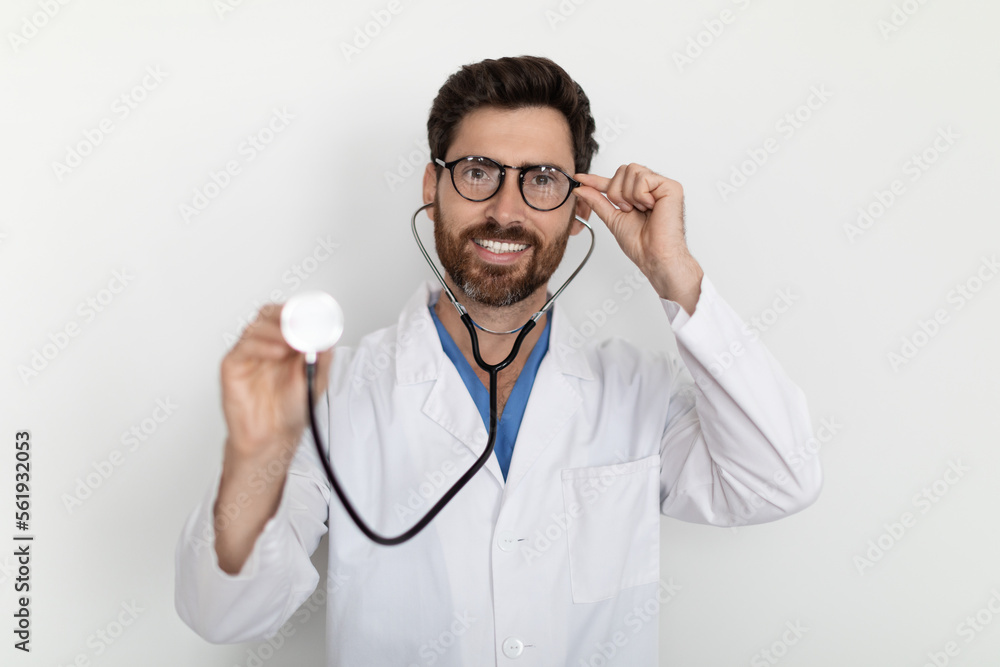 Medical Check Up. Portrait Of Handsome Young Male Doctor With Stethoscope Medical Check Up. Portrait Of Handsome Young Male Doctor With Stethoscope