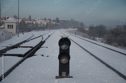 Train lights on the winter rails