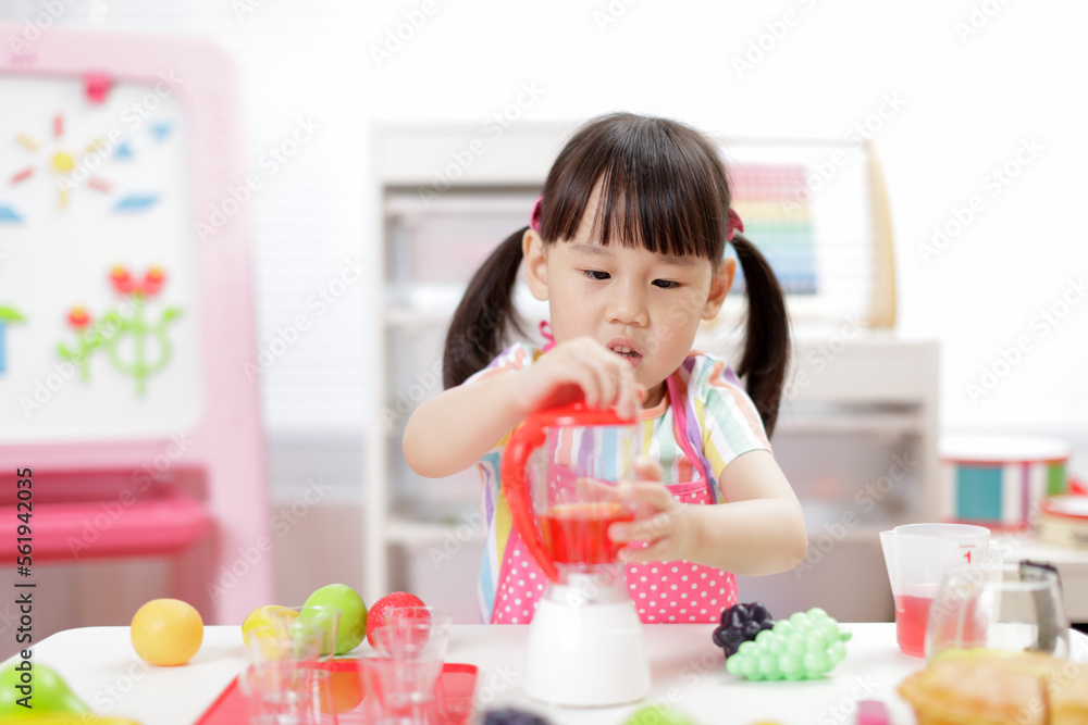 young girl pretend play food preparing at home young girl pretend play food preparing at home