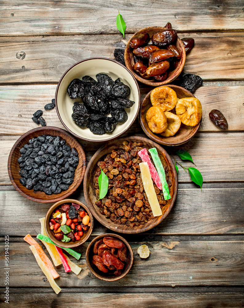 Assortment of different dried fruits in bowls. Assortment of different dried fruits in bowls.