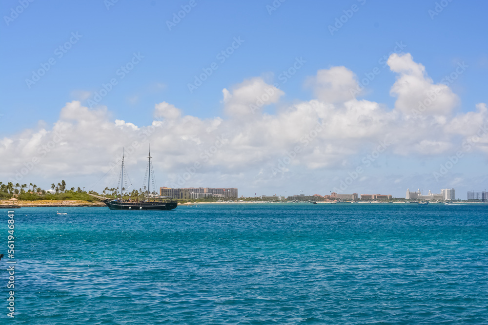 A tourist boat Aruba offshore. Snorkeling trip at Caribbean sea. 