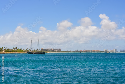 A tourist boat Aruba offshore. Snorkeling trip at Caribbean sea. 