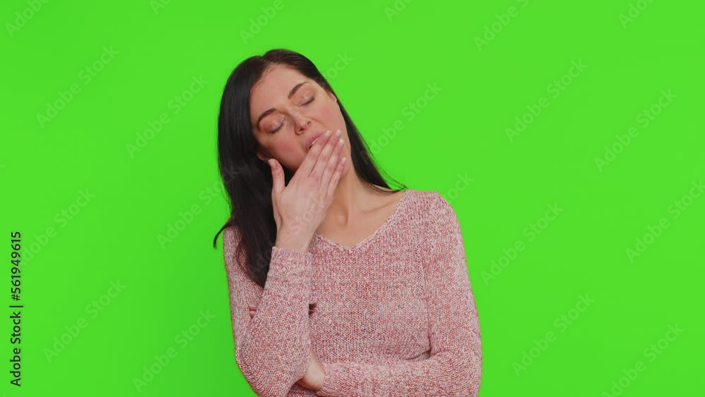 Sad tired bored pretty woman indifferent expression, exhausted of tedious story, not interested in communication talk, displeasure, uninteresting. Young girl isolated alone on chroma key background Sad tired bored pretty woman indifferent expression, exhausted of tedious story, not interested in communication talk, displeasure, uninteresting. Young girl isolated alone on chroma key background