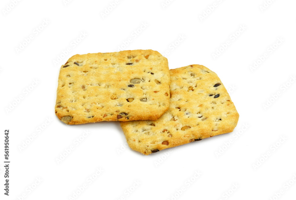 multigrain flatbread crackers isolated on a white background. multigrain flatbread crackers isolated on a white background.