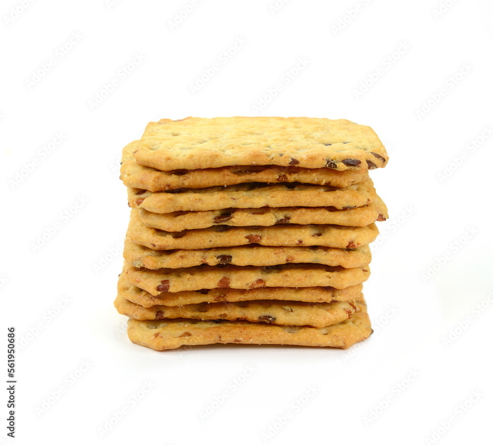 multigrain flatbread crackers isolated on a white background. multigrain flatbread crackers isolated on a white background.