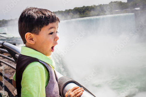 Little boy looking in awe at Niagara Falls photo