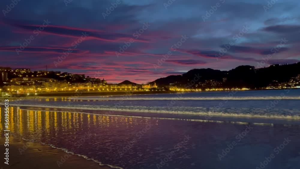 Beautiful colours sunset sky at La Contxa bay in San Sebastian, Spain Beautiful colours sunset sky at La Contxa bay in San Sebastian, Spain