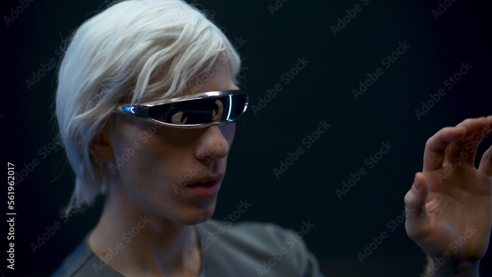 Digital glasses man travelling metaverse outer space. Gamer gesturing touching Digital glasses man travelling metaverse outer space. Gamer gesturing touching