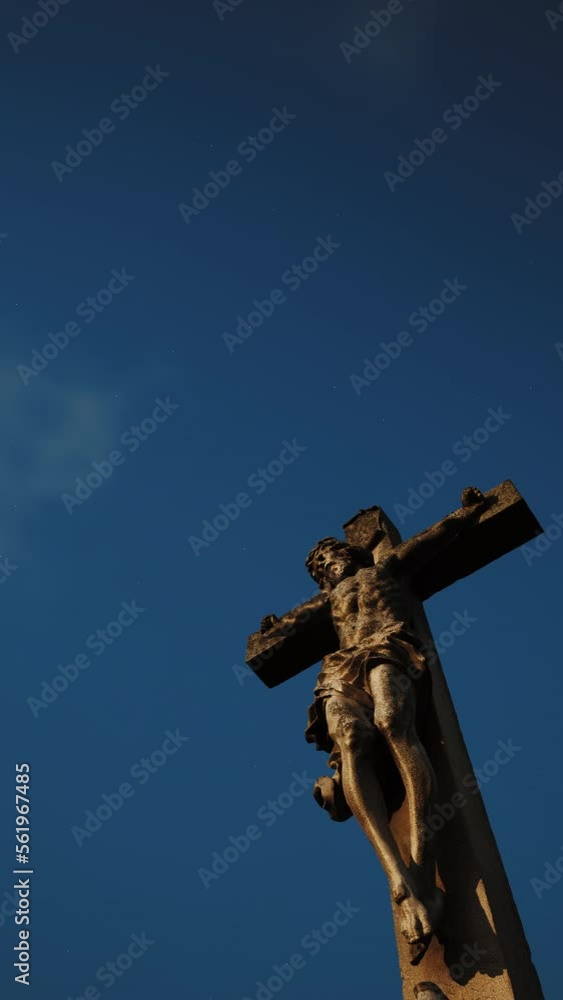 The cross on the Golgotha hill with beautiful fast moving clouds on the blue sky. Resurrection, new life, Vertical video. Easter video postcard. The cross on the Golgotha hill with beautiful fast moving clouds on the blue sky. Resurrection, new life, Vertical video. Easter video postcard.