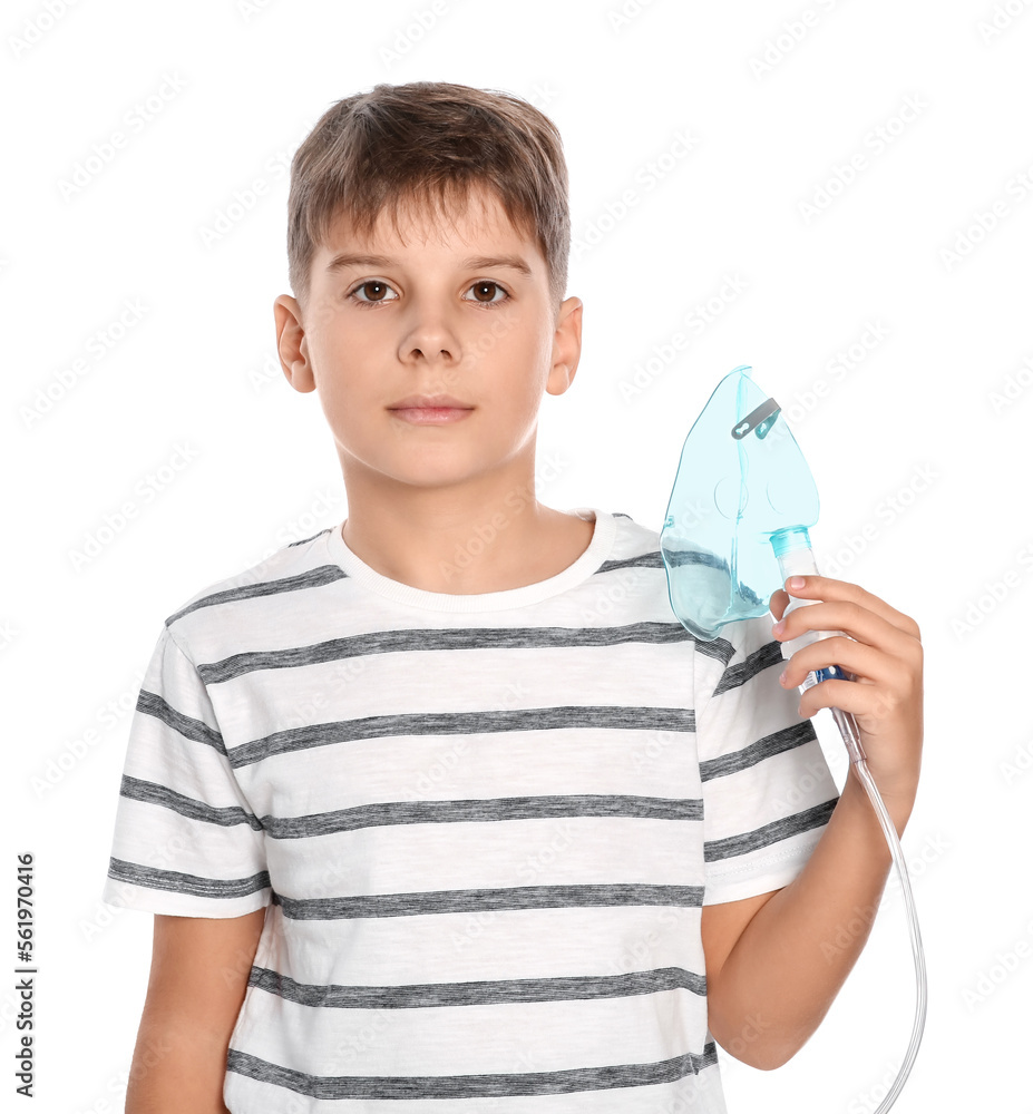 Boy holding nebulizer for inhalation on white background Boy holding nebulizer for inhalation on white background