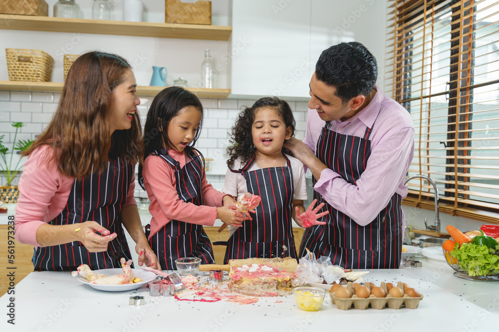 happy family funny kids are cooking the dough, baking cookies in the kitchen, Homemade food, and little helper. happy family funny kids are cooking the dough, baking cookies in the kitchen, Homemade food, and little helper.