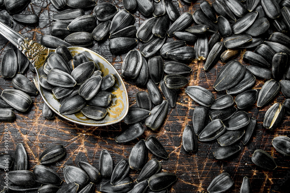 Sunflower seeds with a spoon. Sunflower seeds with a spoon.