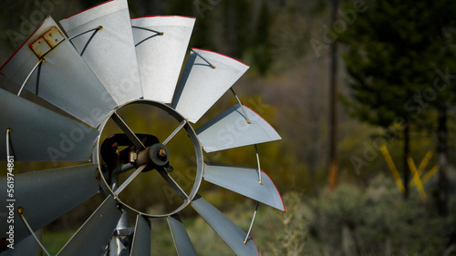 small metal windmill for yard macro shot bokeh single item focus