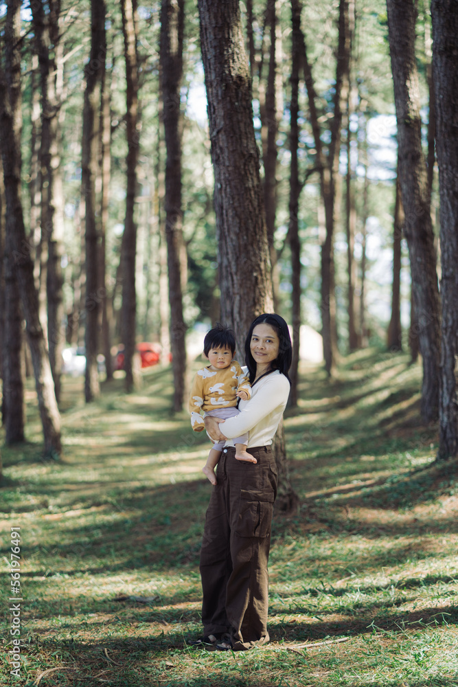 mother and child playing in the park mother and child in autumn park mother and child playing in the park mother and child in autumn park