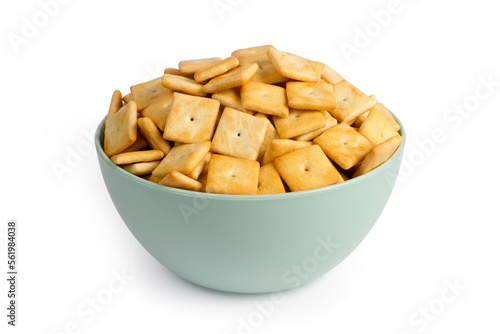 Cookie crackers in a plate on a white background.