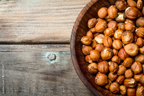 The shelled hazelnuts in a bowl.
