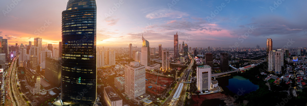 Fototapeta premium Jakarta Panoramic from Sudirman street view during the golden hour. Jakarta is capital city of indonesia before it be moved to Kalimantan.