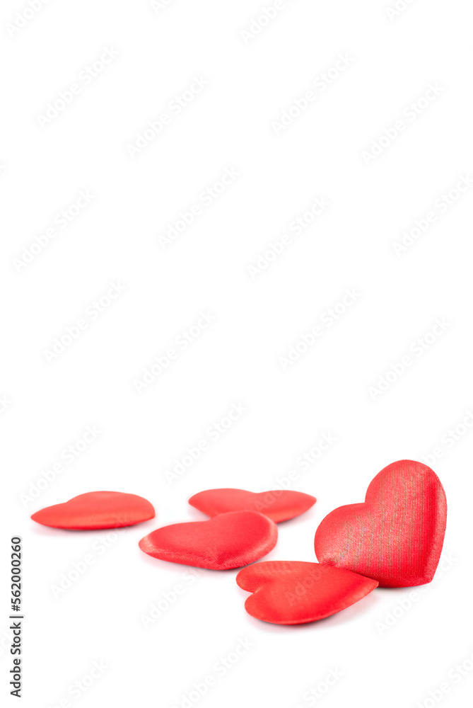 Pile of red hearts shapes on a white background with copy space above, Valentines day concept. Pile of red hearts shapes on a white background with copy space above, Valentines day concept.