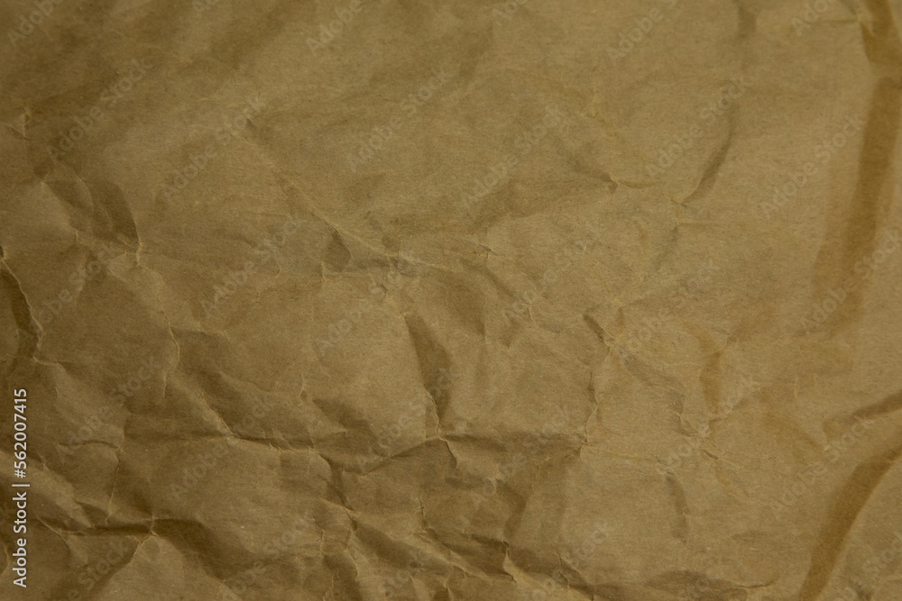 Obraz premium Brown wrinkle paper background texture. Brown template. Brown paper background.