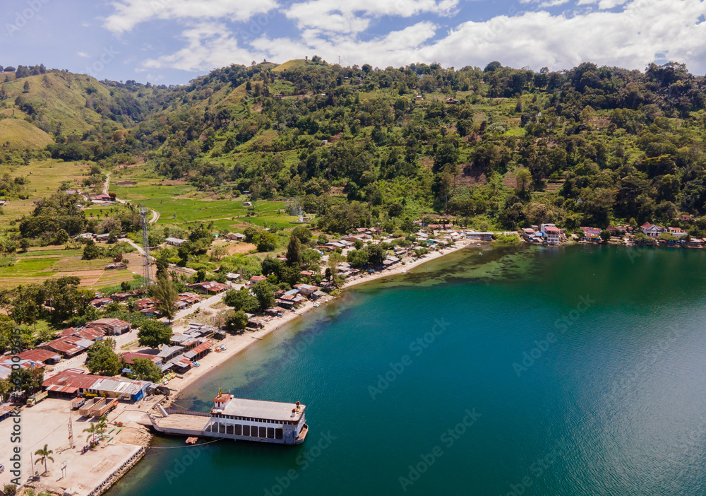 Beautiful view of Toba Lake, a popular tourist destination in North Sumatra, Indonesia. Lake Toba is a large natural lake located in the caldera of Mount Supervolcano.