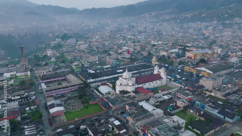 Fast aerial rotation around the central cathedral in San Juan Ostuncalco, Guatemala. Fast aerial rotation around the central cathedral in San Juan Ostuncalco, Guatemala.