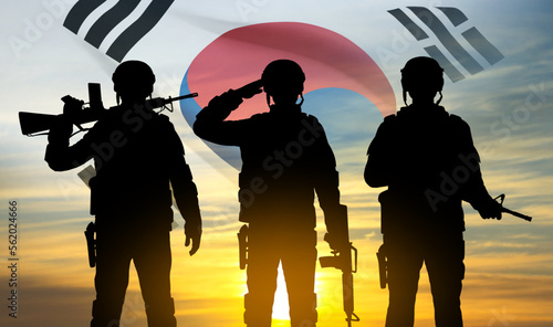 Silhouettes of soldiers on background of sunset and South Korea flag. Armed forces of Korea. Background for Memorial Day, Liberation Day. EPS10 vector