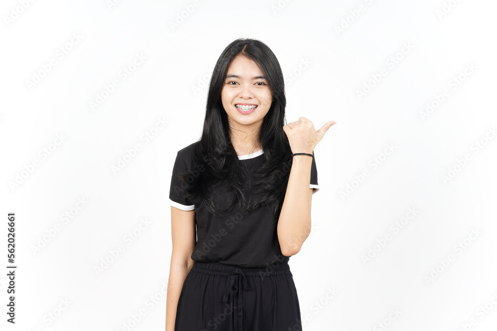 Presenting and Pointing Right Side Product Using Thumb Of Beautiful Asian Woman Isolated On White Presenting and Pointing Right Side Product Using Thumb Of Beautiful Asian Woman Isolated On White