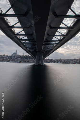 Long exposure. View of Haliç Metro Bridge connecting Azapkapı (Beyoğlu) and Unkapanı (Fatih) (Halic Metro Bridge). blue sky Istanbul Turkey  © osman