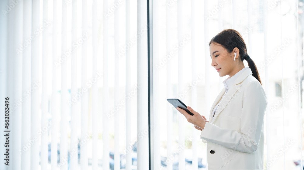 Asian businesswoman working with tablet Start up small business owner. business successful technology concept Asian businesswoman working with tablet Start up small business owner. business successful technology concept