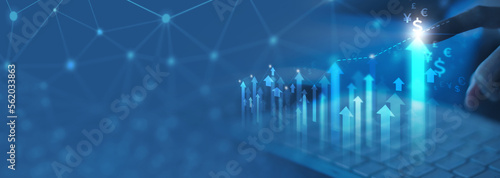 Foto analysis profitability of working companies with digital augmented reality graphics, positive indicators businesswoman calculates financial data for long-term investments