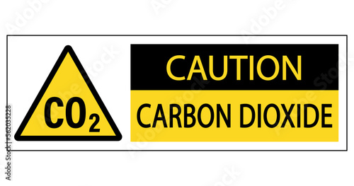 Caution, carbon dioxide. Yellow triangle warning sign with CO2 symbol and text by side.