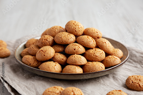 Homemade Italian Amaretti Cookie Biscuits on a Plate, side view. Close-up