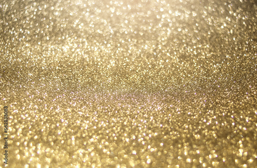 Abstract of Gold. Bright and sparkling bokeh background. Luxury design background.