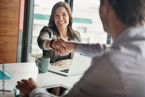 Business people, handshake and welcome for tech meeting, partnership deal and employee collaboration. Hello, thank you and corporate workers shaking hands for teamwork, onboarding or b2b interview photo