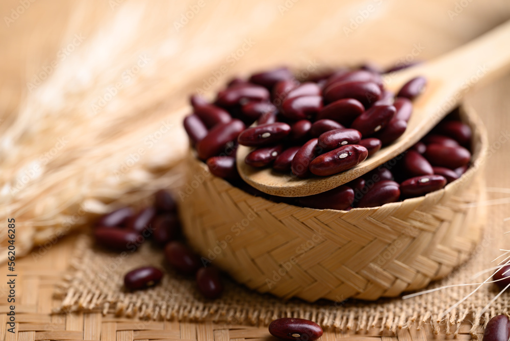 Red kidney beans seed in bamboo basket with spoon, food ingredients