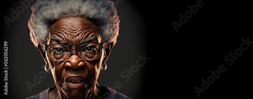 Fotografia African american grandma with grey hair raging and looking very angry directly a